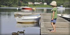 A dock at Wethersfield Cove serves boats moored there.