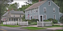 Main Street houses proudly display the American Flag.